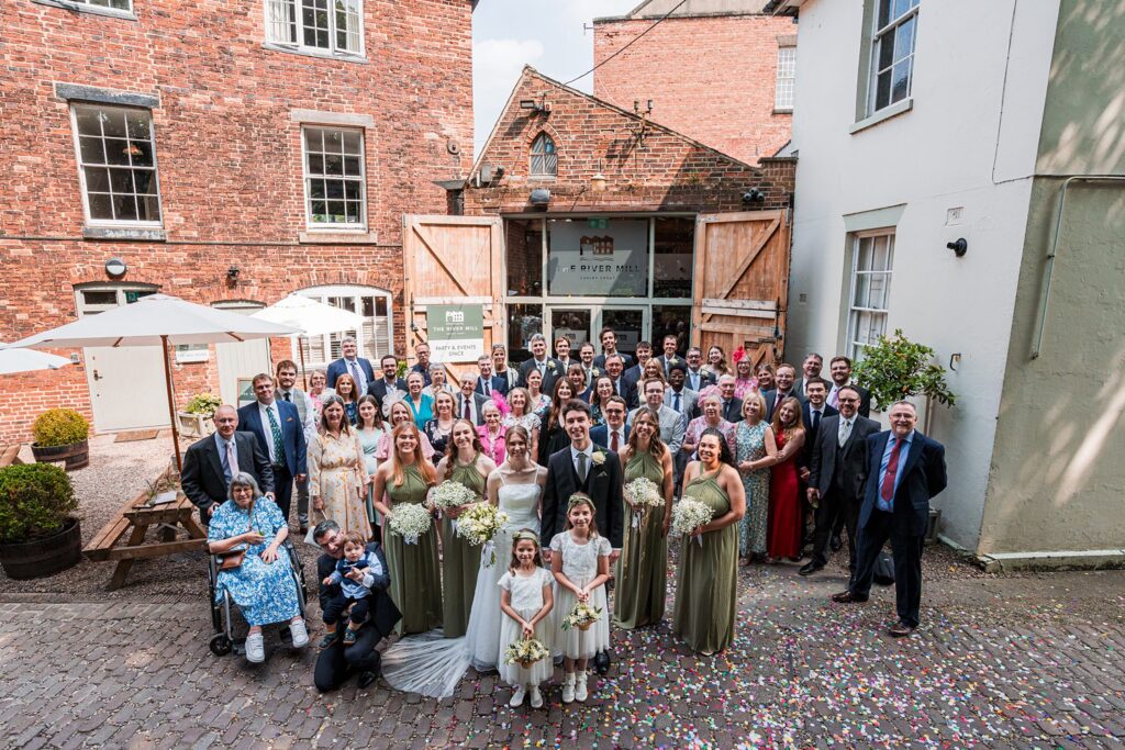 Large wedding group photo at The River Mill.