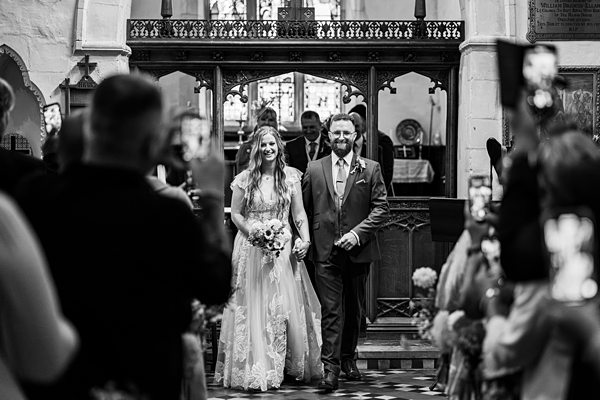 Bride and father walking down the aisle