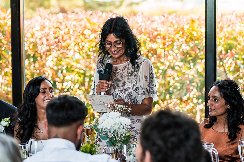 Woman giving a speech at an event